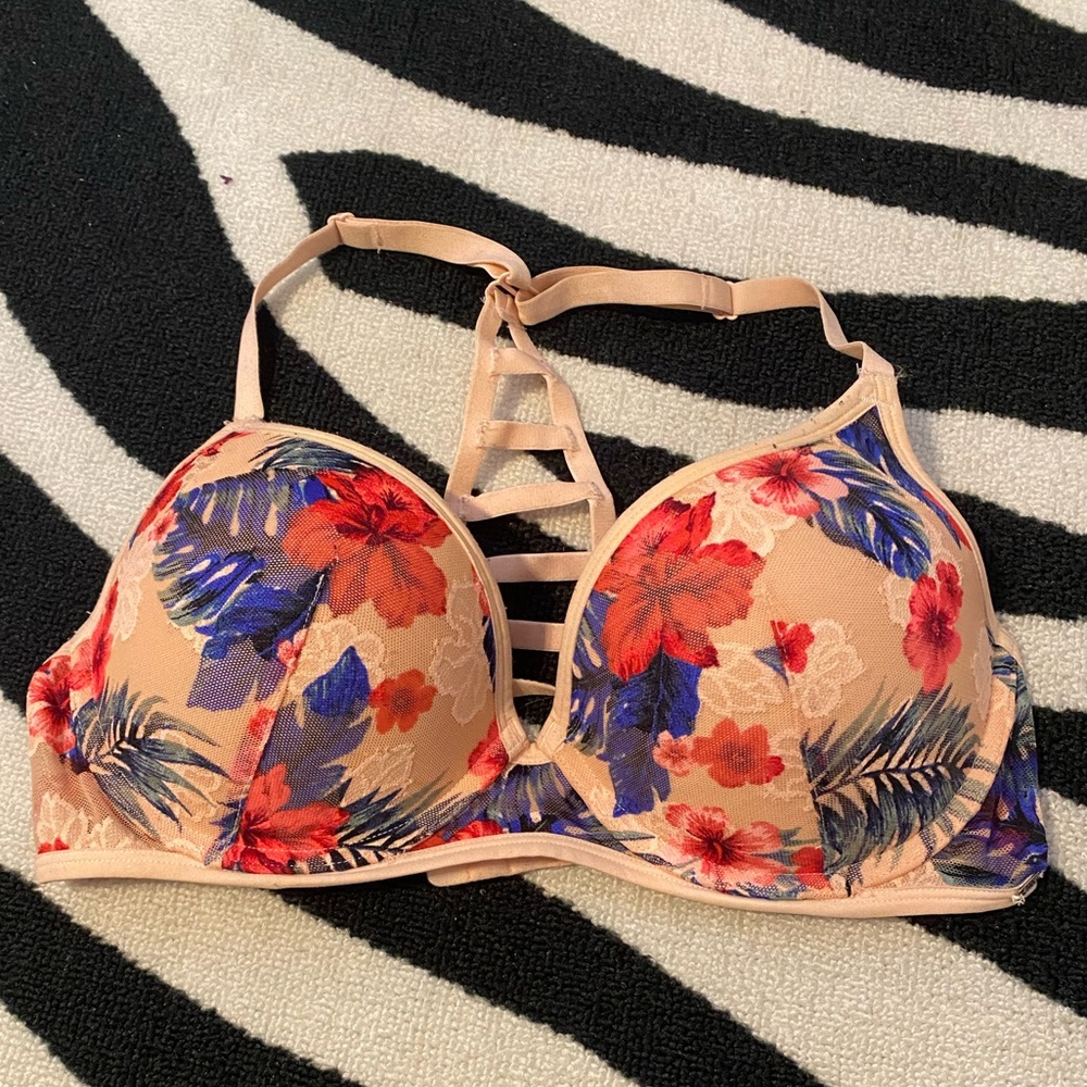 Pink Victoria Secret Brand Bra. Size is 34D.